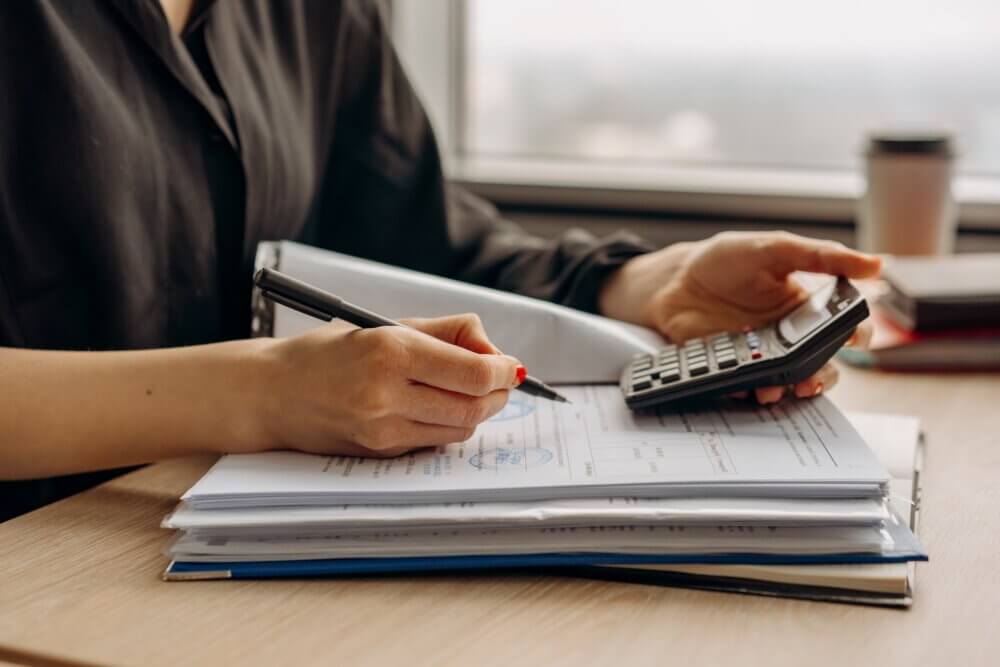 person using calculator