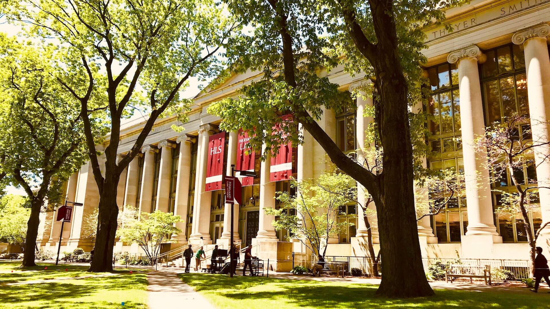 Harvard School of Law building in front of green grass