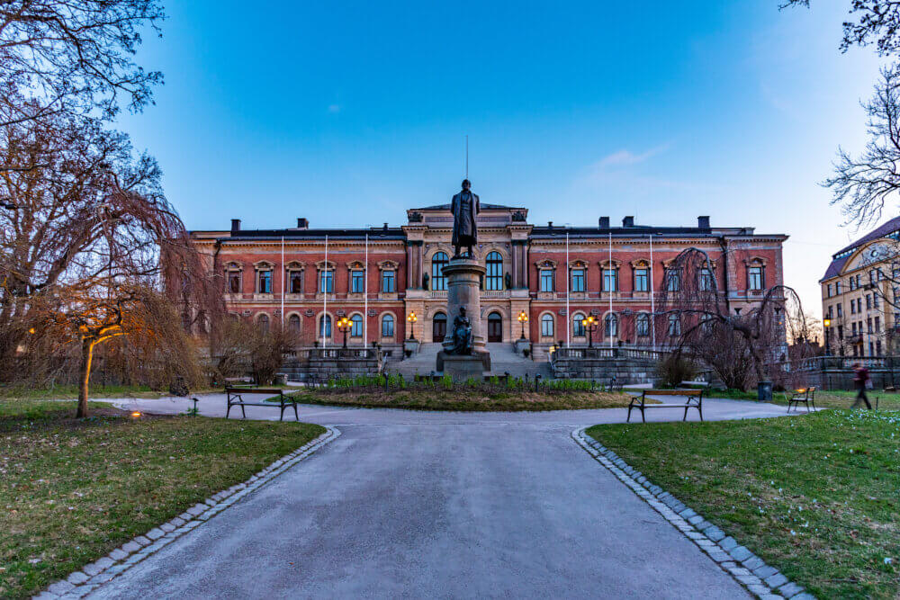 Sunset view of Statue of Erik Gustaf Geijer in front of the university of Uppsala in Sweden