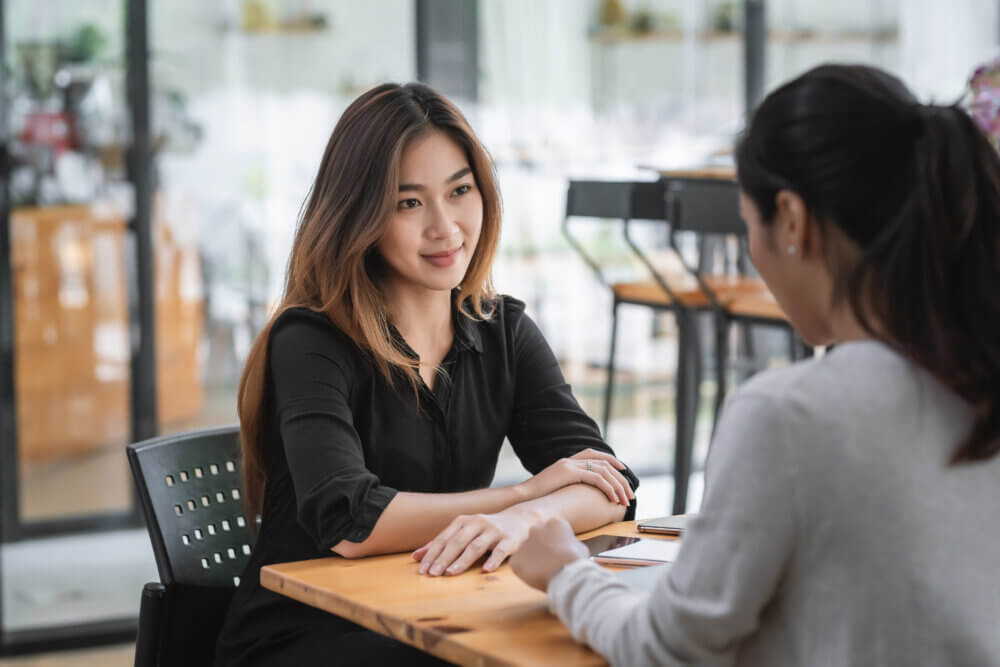 Young Asian businesswoman meeting working together at the office.