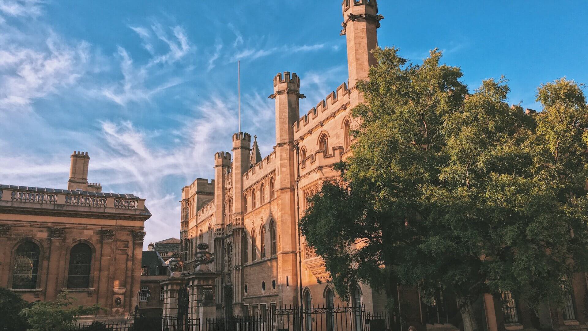 people walking on street near Cambridge University