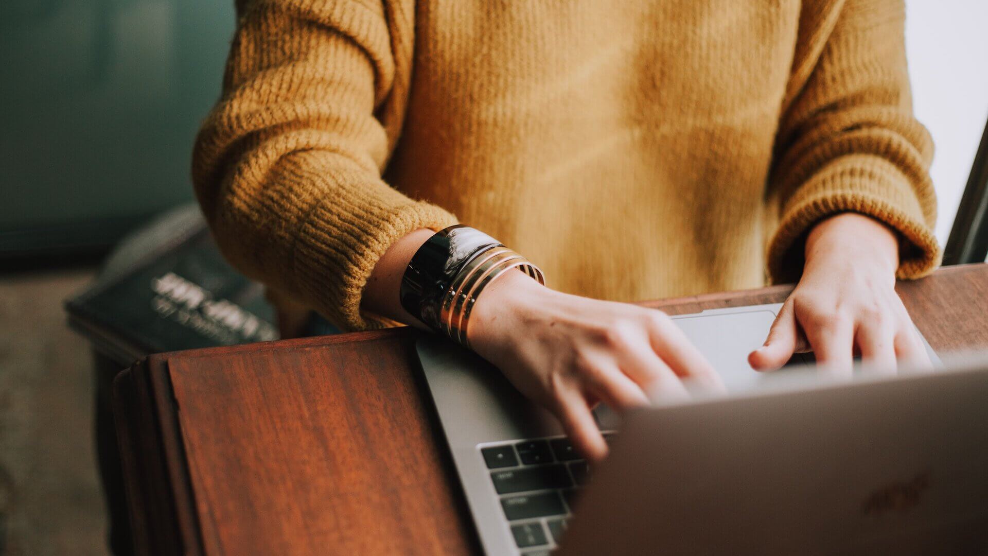 woman typing on computer
