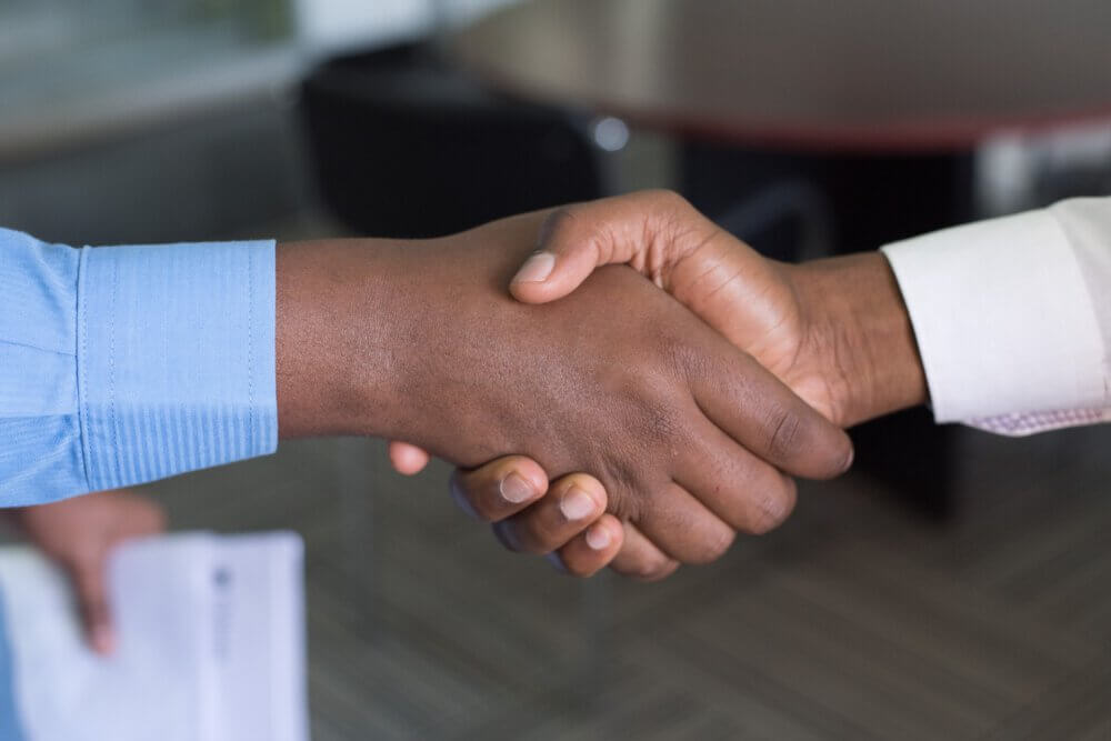 hand in hand shaking