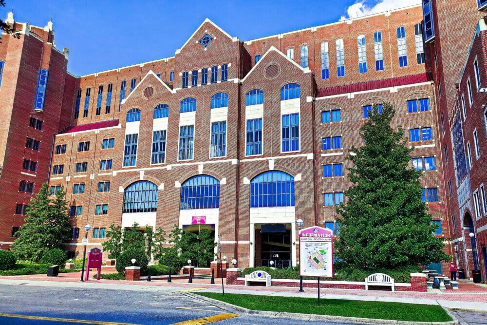 Florida State University campus building exterior on a blue sky, sunny day