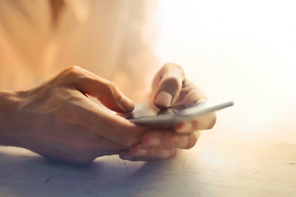 person holding an iPhone