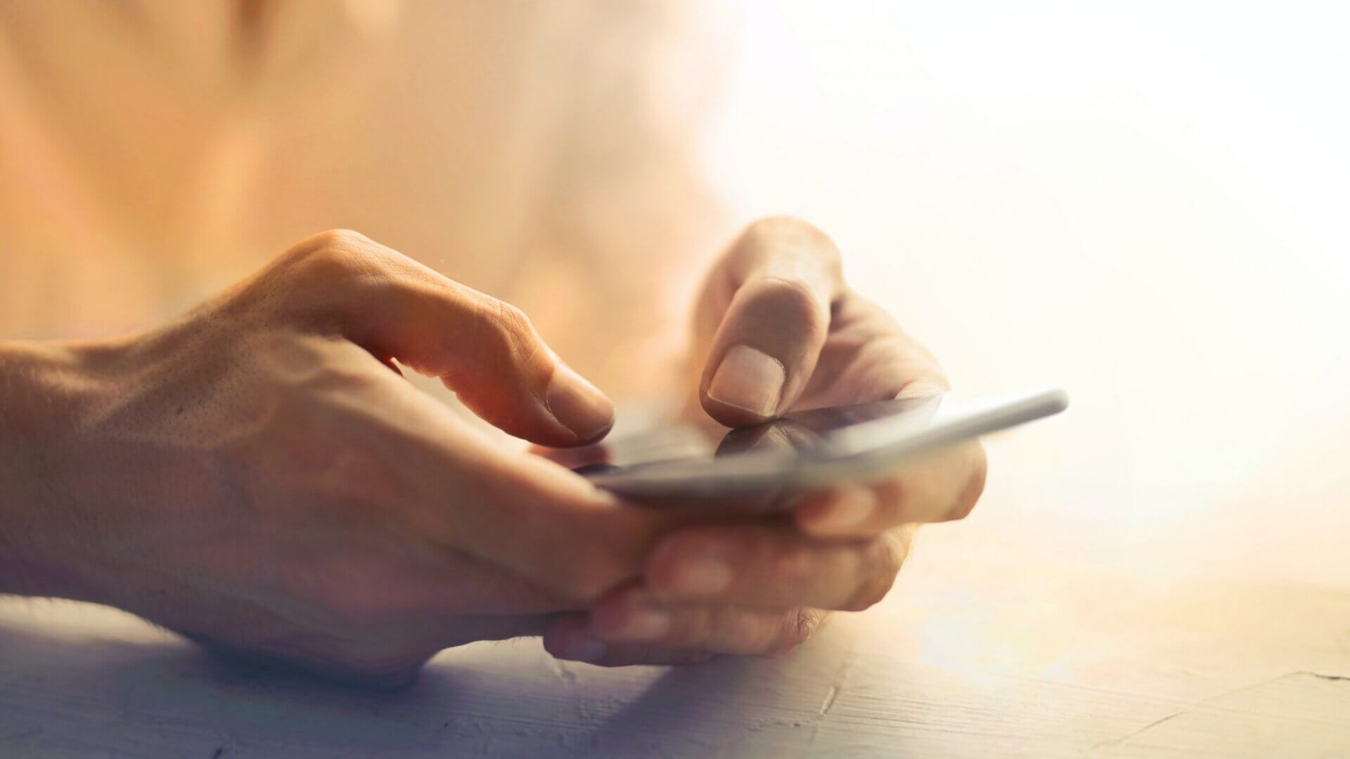 person holding an iPhone