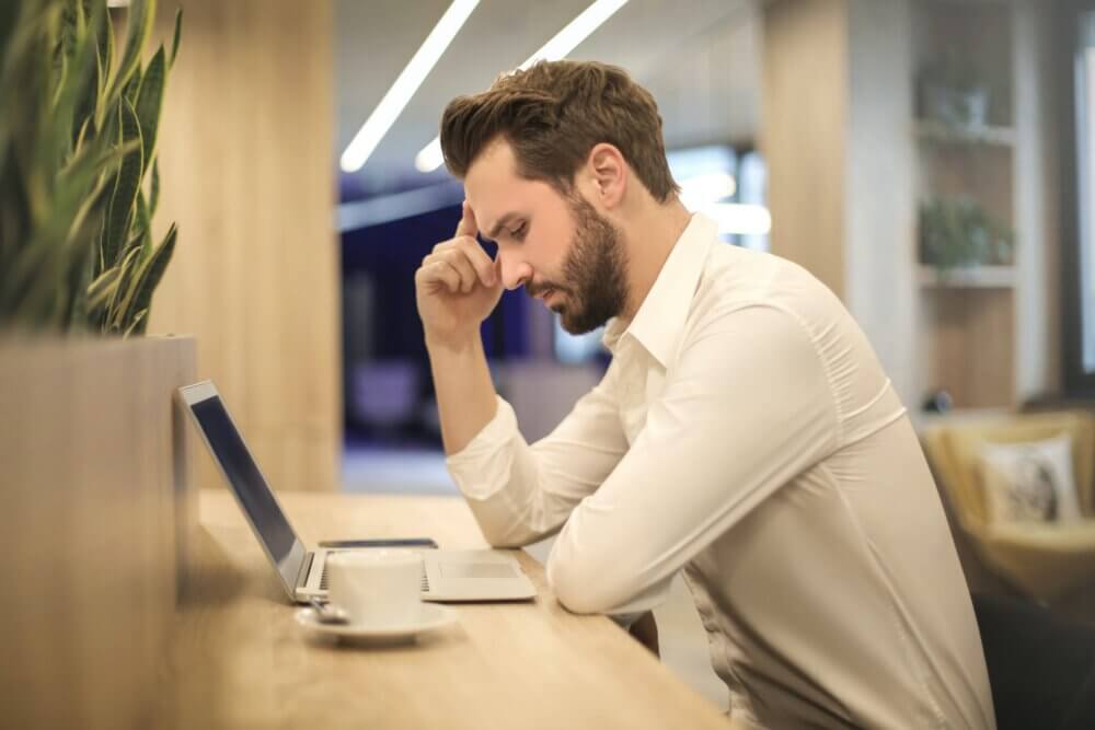 Man reading something on computer