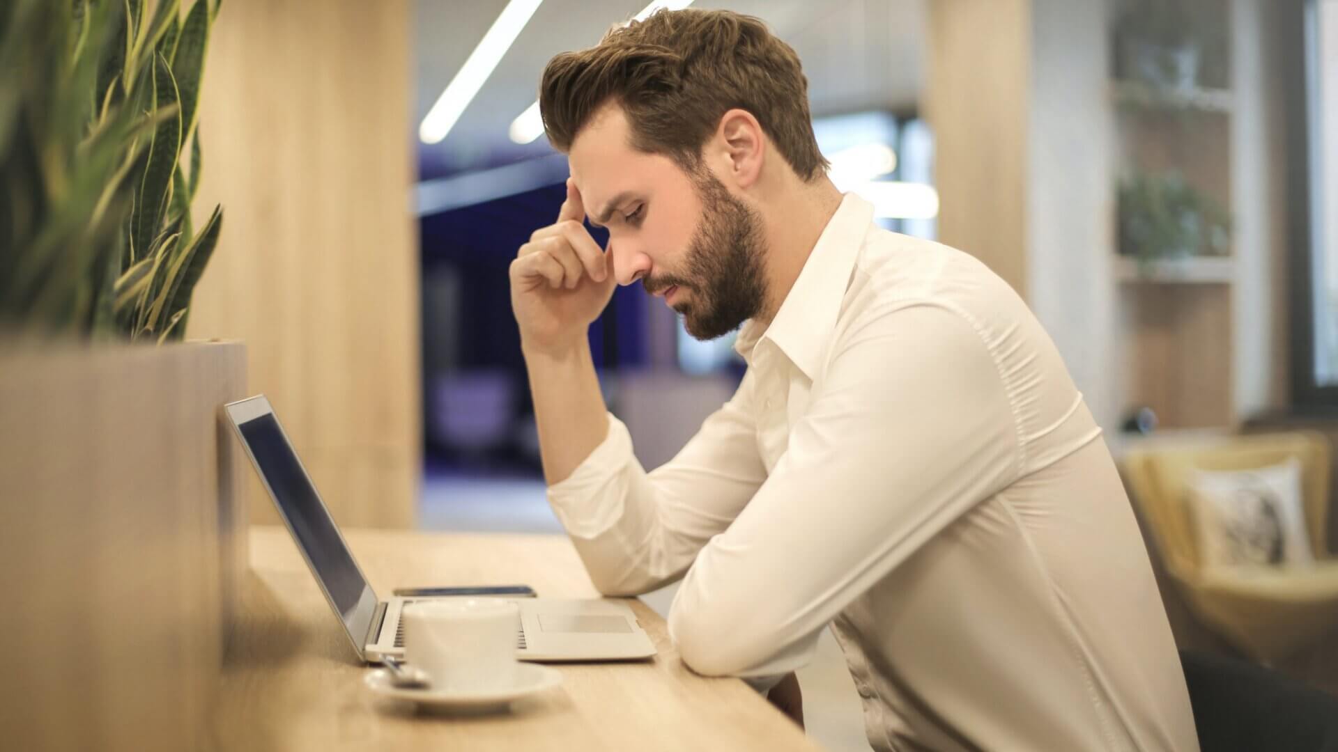 Man reading something on computer
