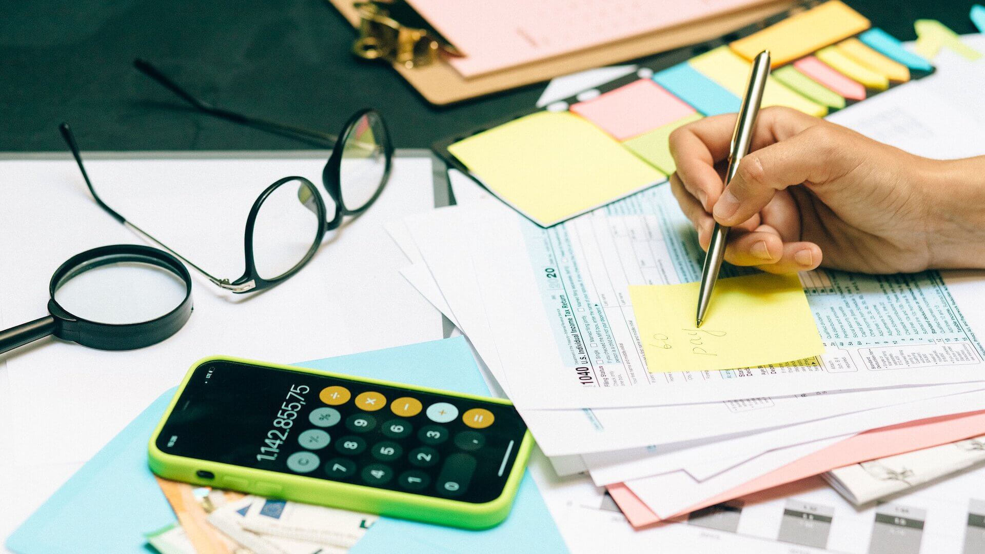 person calculating their debt