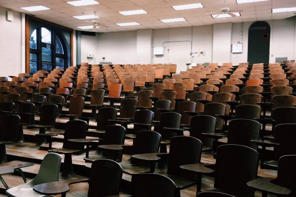 Empty student desks in classroom